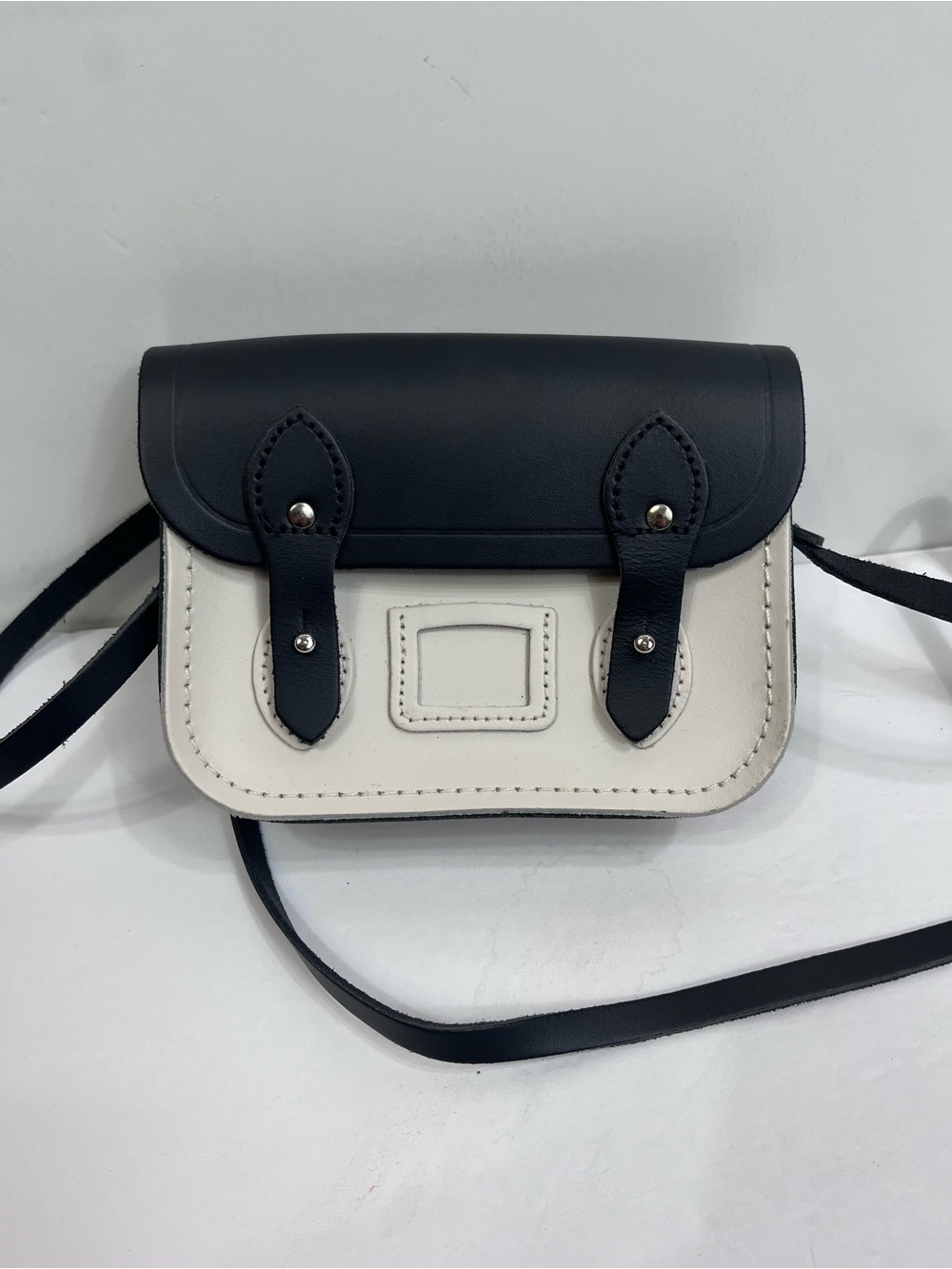 The Cambridge Satchel Company Black and Bone White Mini Crossbody Satchel